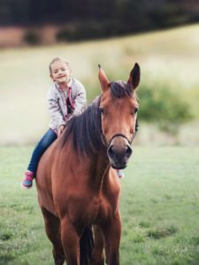 Girl Horseback riding